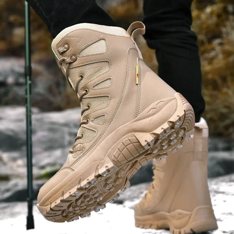 Men's beige cowhide hi-top hiking shoes on a rocky outdoor trail.