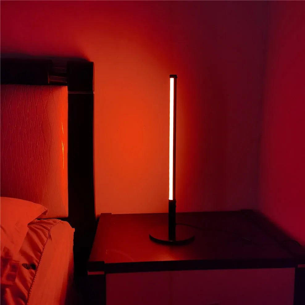 Black retro decorative atmosphere lamp with aluminium alloy body on a side table.