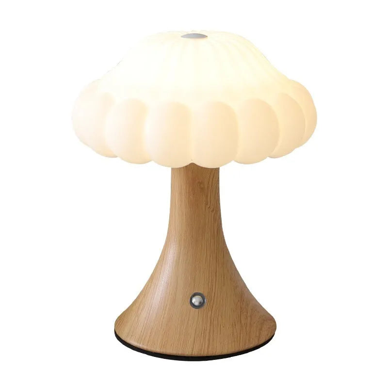 Mushroom-shaped touch control night lamp in wood grain colour on a table
