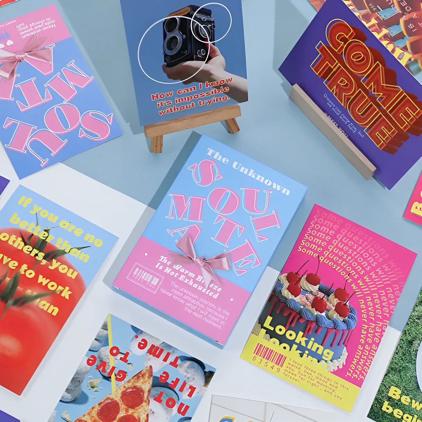 Box of fresh-style printed postcards showing the two design models for gift messages.