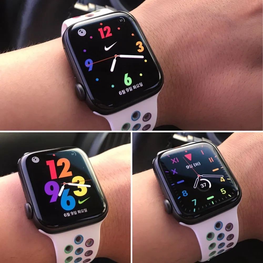 Silicone sports wristband with single buckle strap in black, rainbow, or white colour options