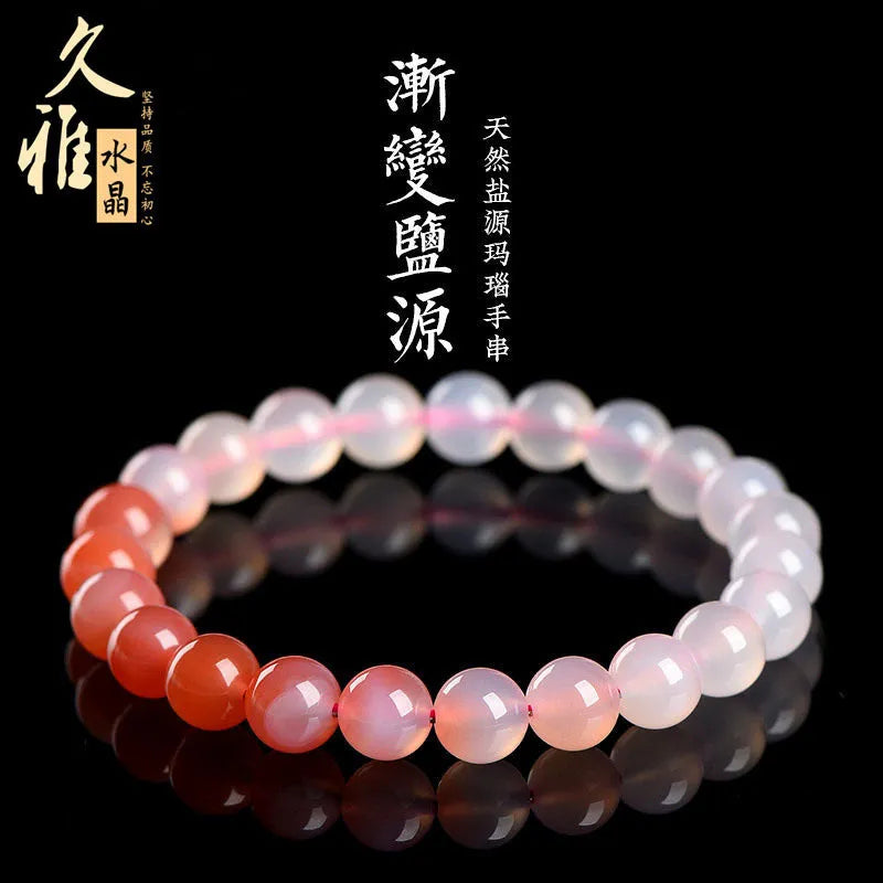 Natural gradient Yanyuan agate bracelet with geometric beads in a salt source colour, shown with size options.