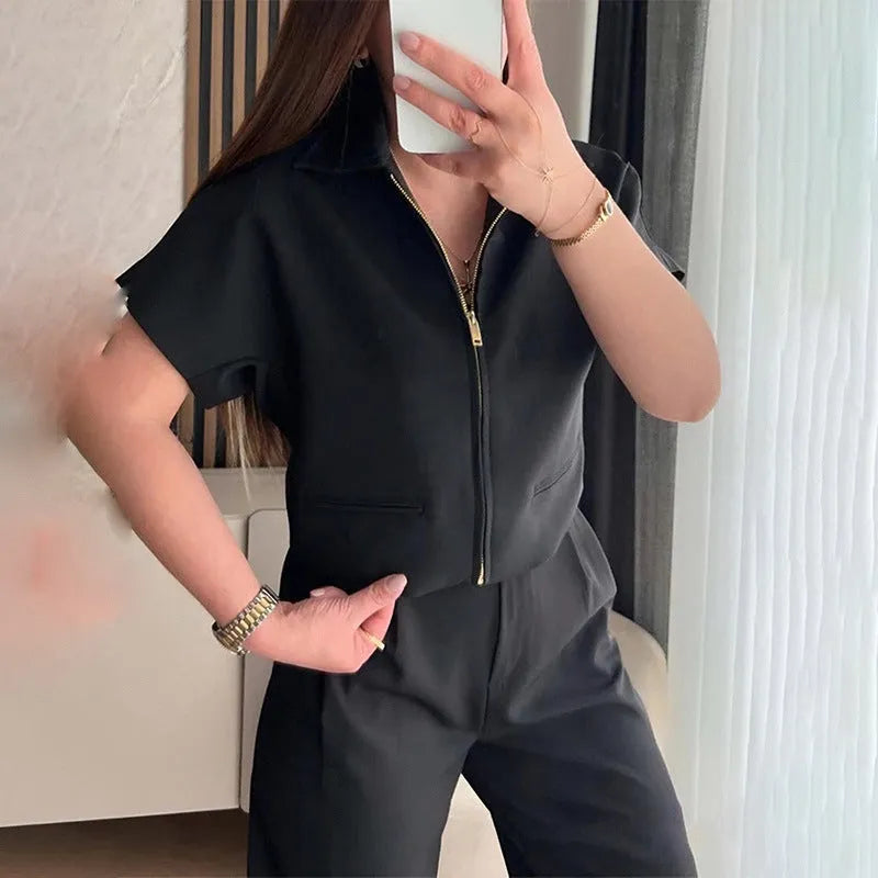 Woman wearing a loose-fitting white damascus-pattern short sleeve polyester casual shirt.