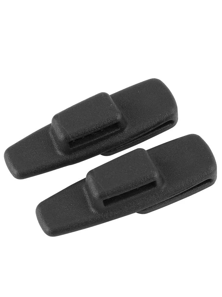 Two black ABS car safety belt stopper universal clips for seat belt adjustment, supplied in OPP bag