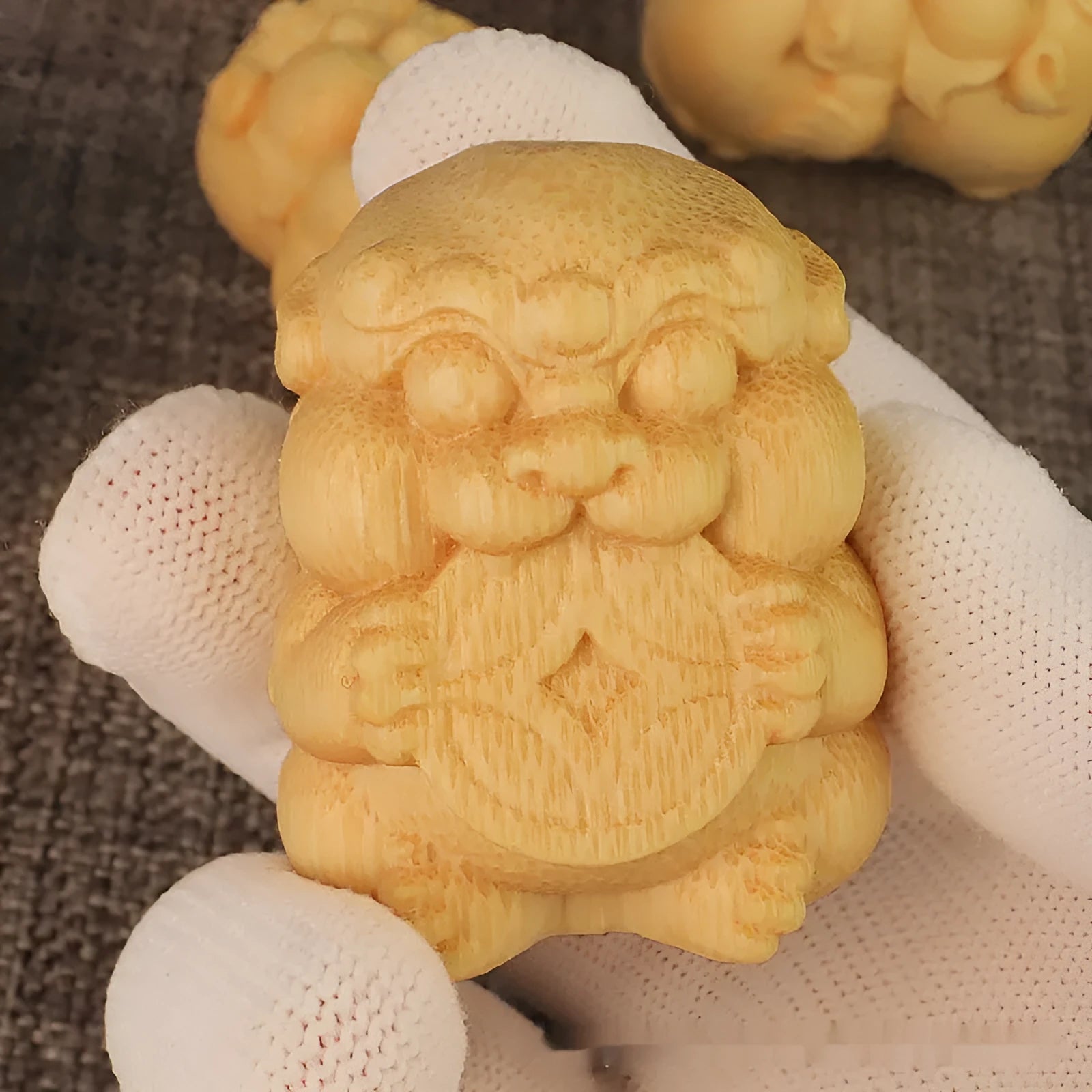 Solid bamboo carving ornament with Take Money design, 4.5cm tall.