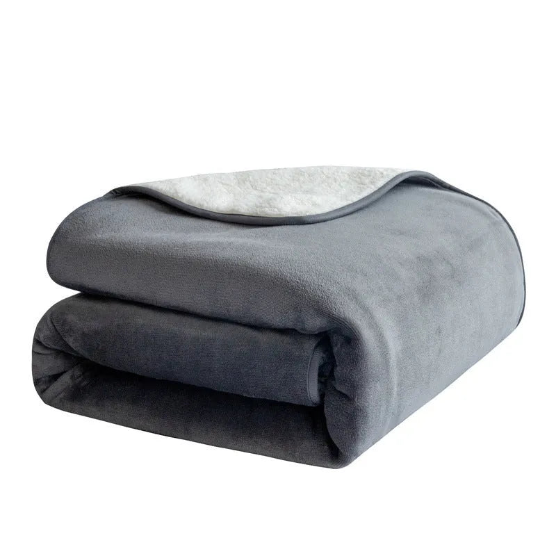 Lambswool waterproof pet blanket duvet in gray 75x100cm on a sofa