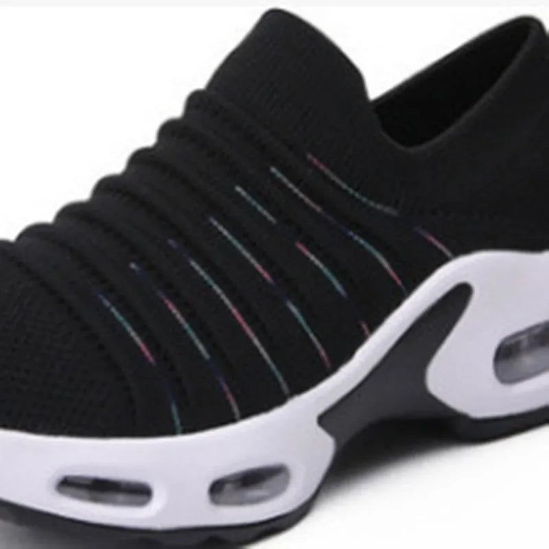 Plus size fly-knit sock shoes in 2088 Tao black with round toe, low heel, and stretch mesh upper
