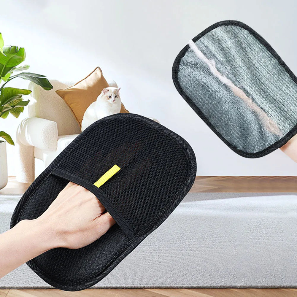 Black pet hair remover glove with silicone bristles for dogs and cats, shown on a hand