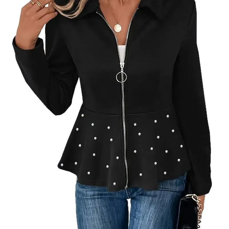 Women's black loose fit coat with heavy-duty zipper and ruffle hem, made from spandex blend fabric.