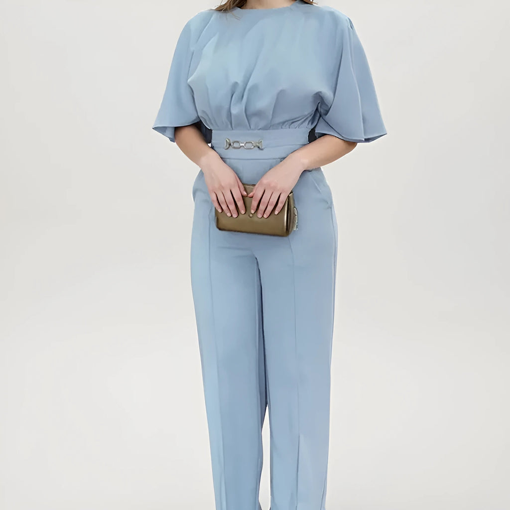 Blue men's casual polyester suit with trousers and a long-sleeve jacket on a hanger.