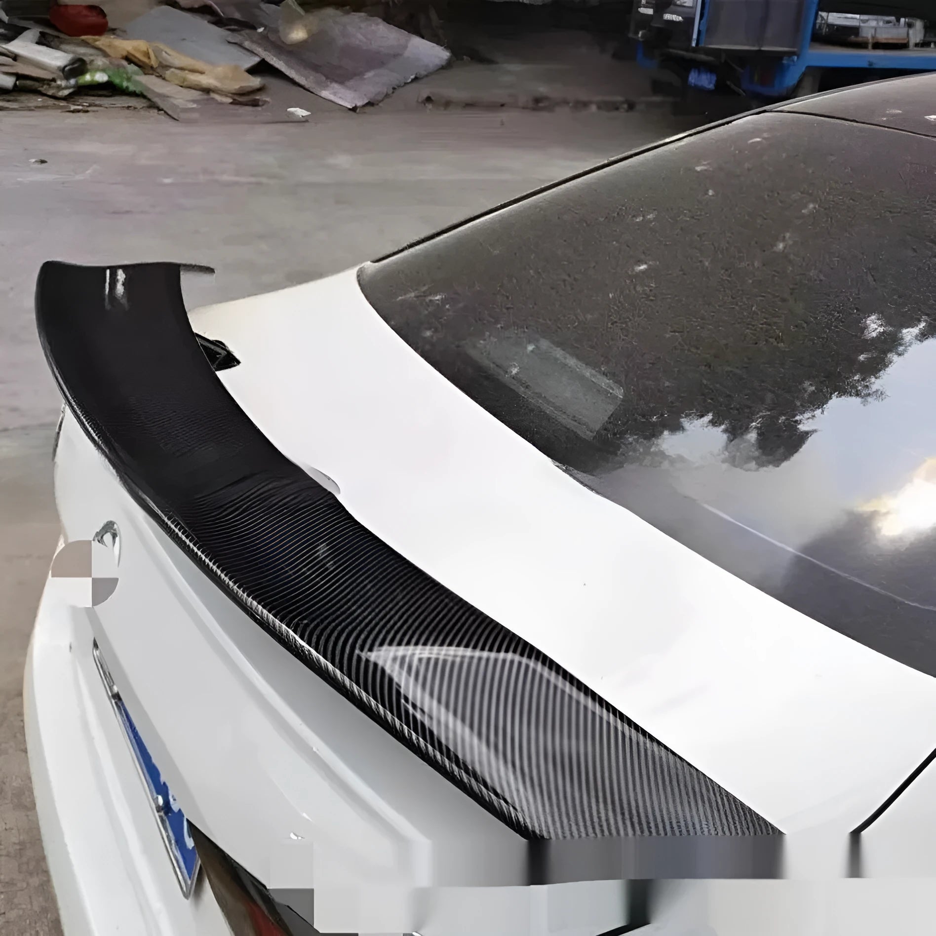 Universal punch-free car spoiler in ABS plastic for exterior modification, shown in available finishes.