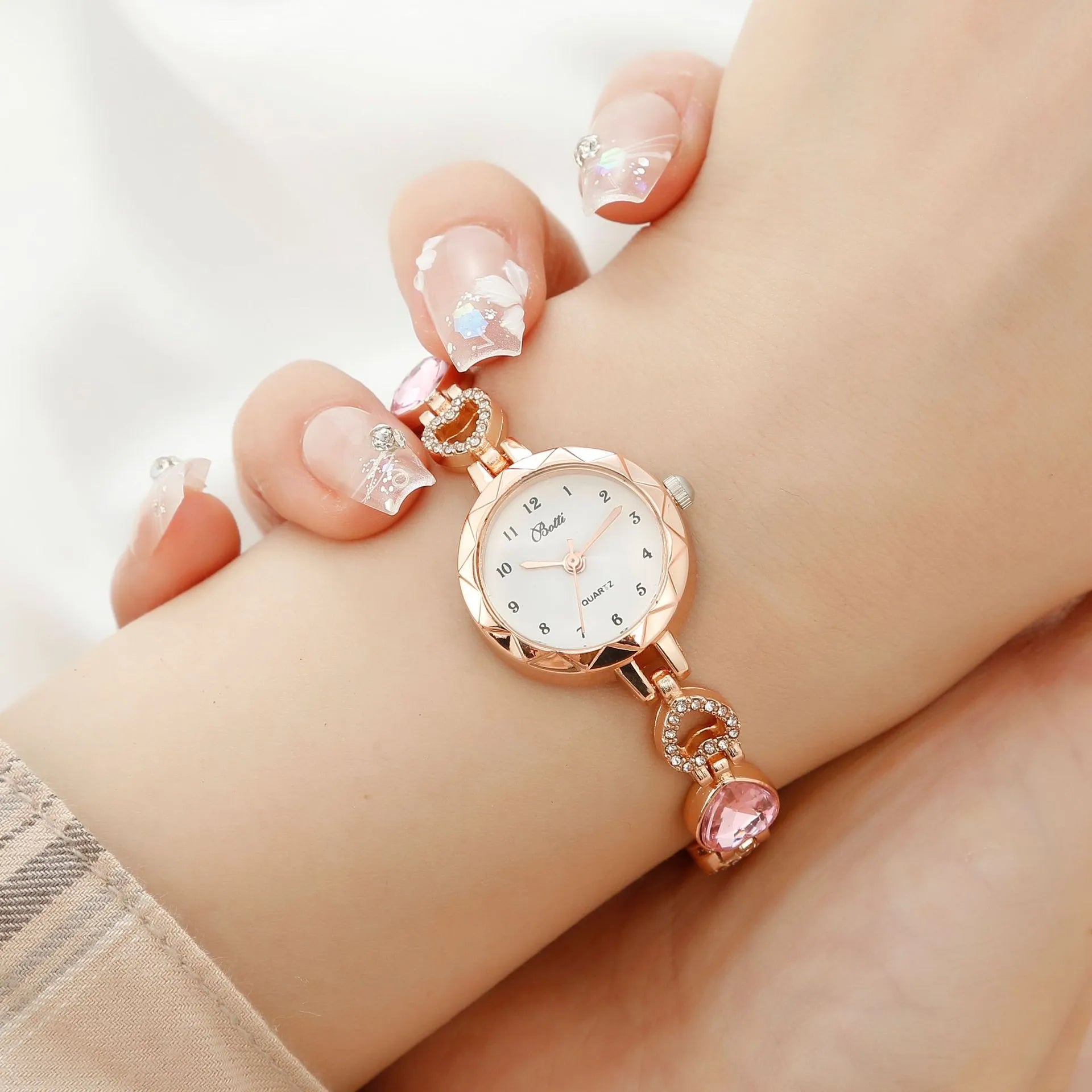 Women's simple disc light luxury quartz bracelet watch set in pink with matching earrings necklace and ring