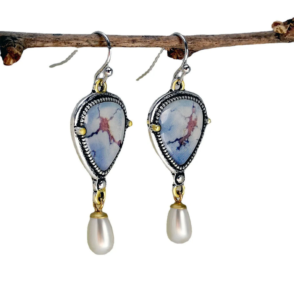 Retro blue electroplated drop earrings with synthetic blue opal and white pearl accents, Bohemian geometric design.