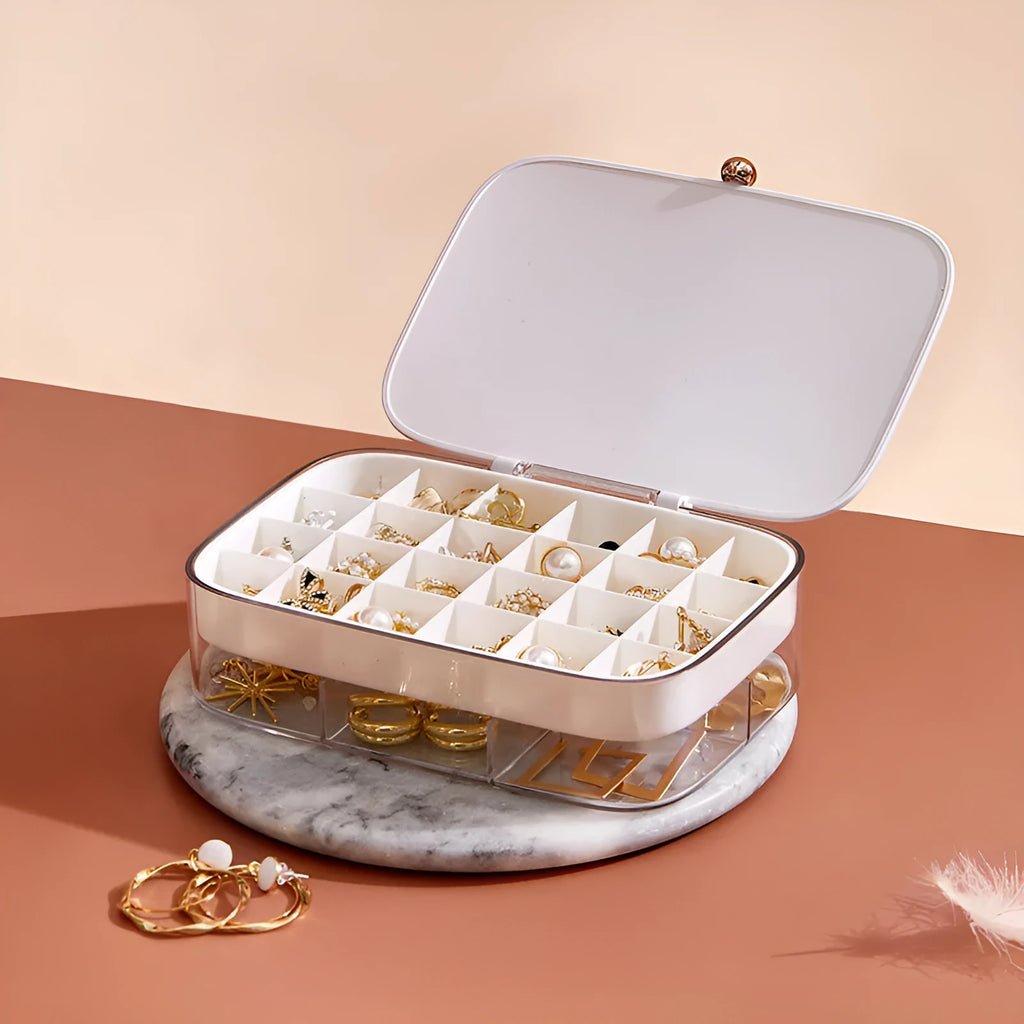 Modern minimalist jewelry storage box with multi-layer organisation in green colour