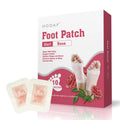 Wood vinegar foot patch with mint scent for adults, 10 pieces per box, placed on a foot sole.