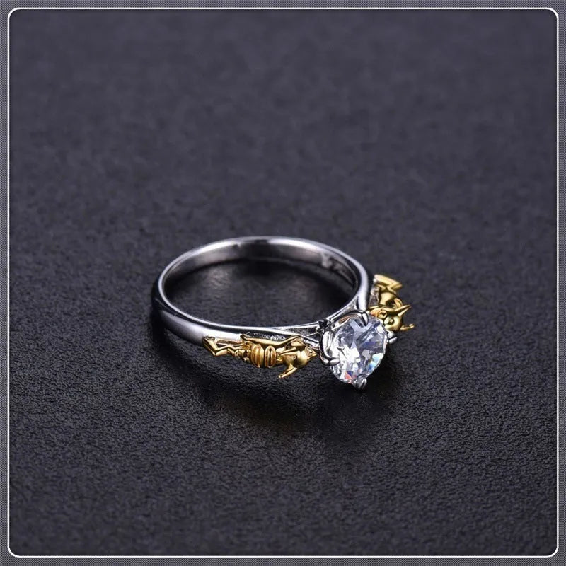 Copper crown crystal ring with black gold finish showing sizing options