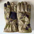 Tactical winter ski gloves with touch screen fingertips and anti-slip grip in camouflage pattern