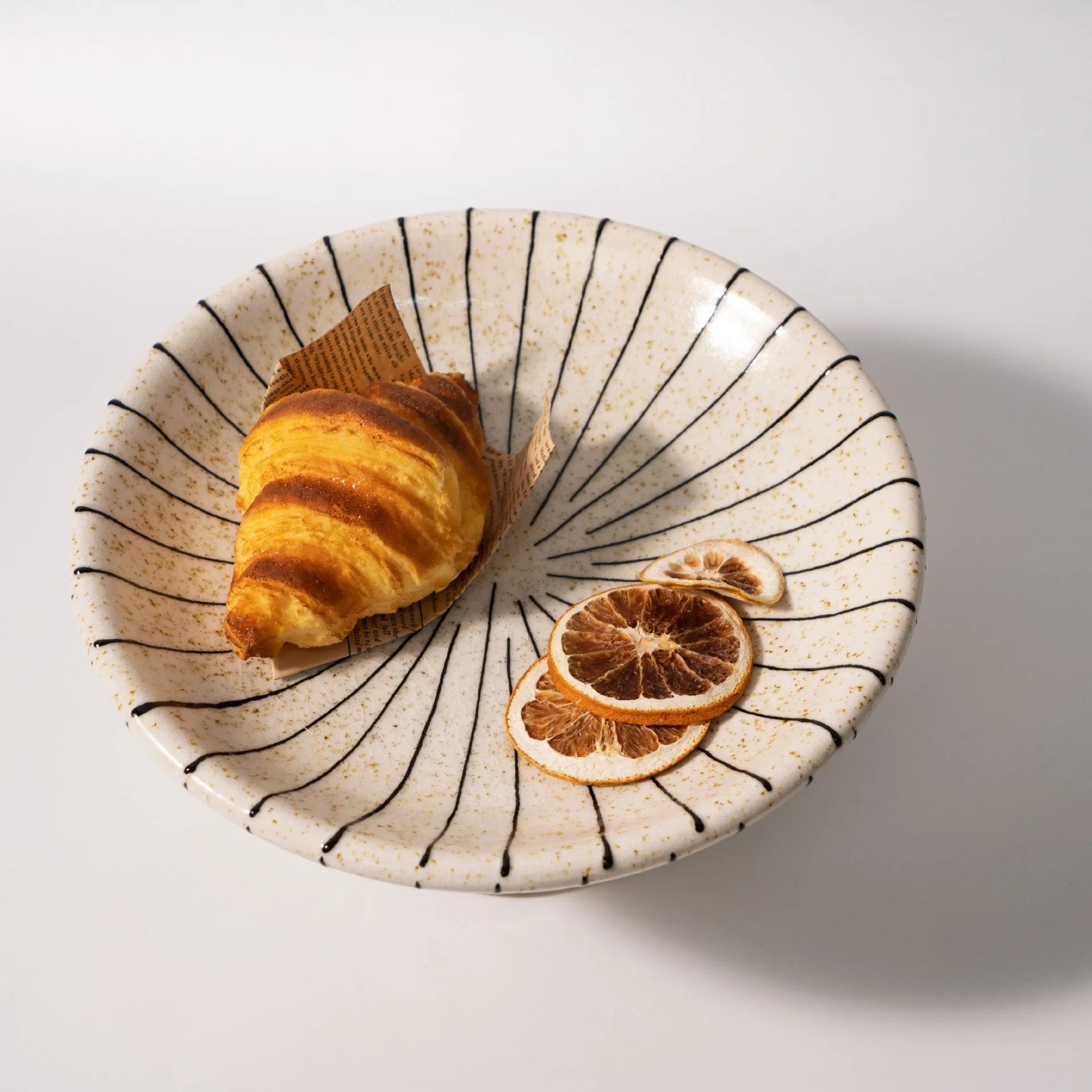 Black and white striped synthetic resin fruit plate with retro geometric pattern