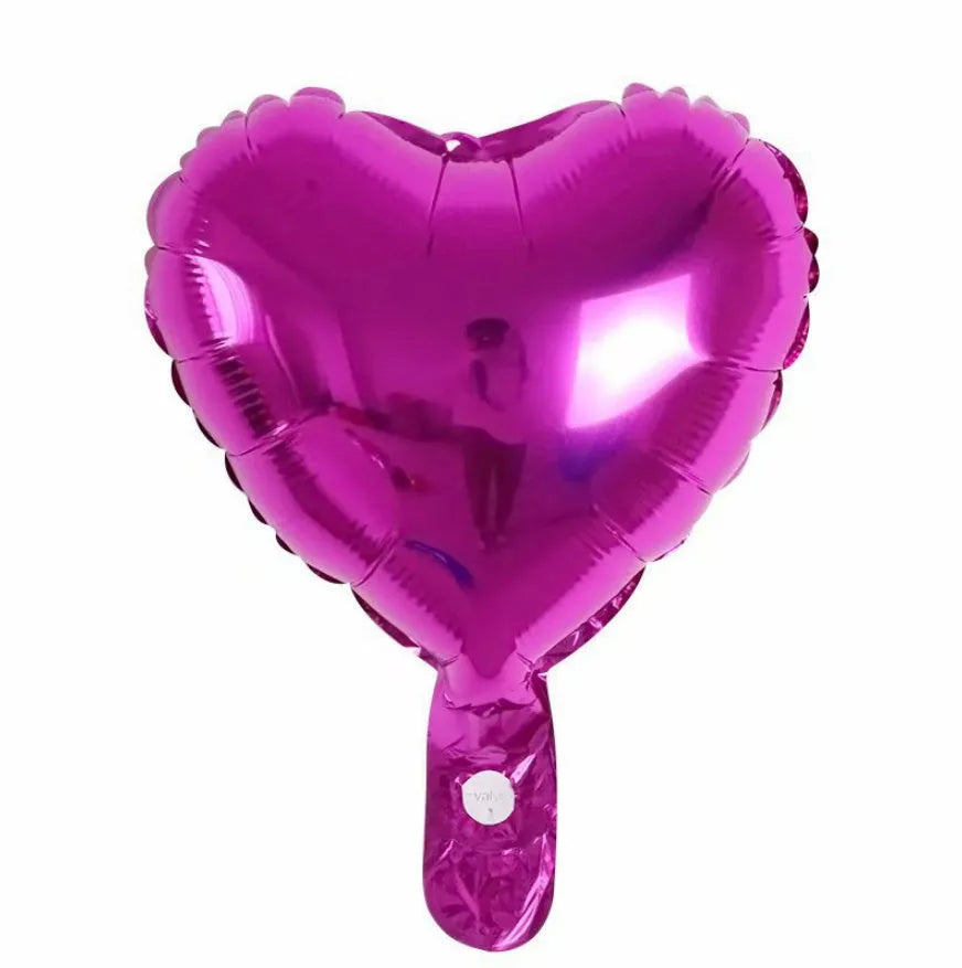 Five peach heart-shaped aluminium foil balloons in metallic colours for party decorations