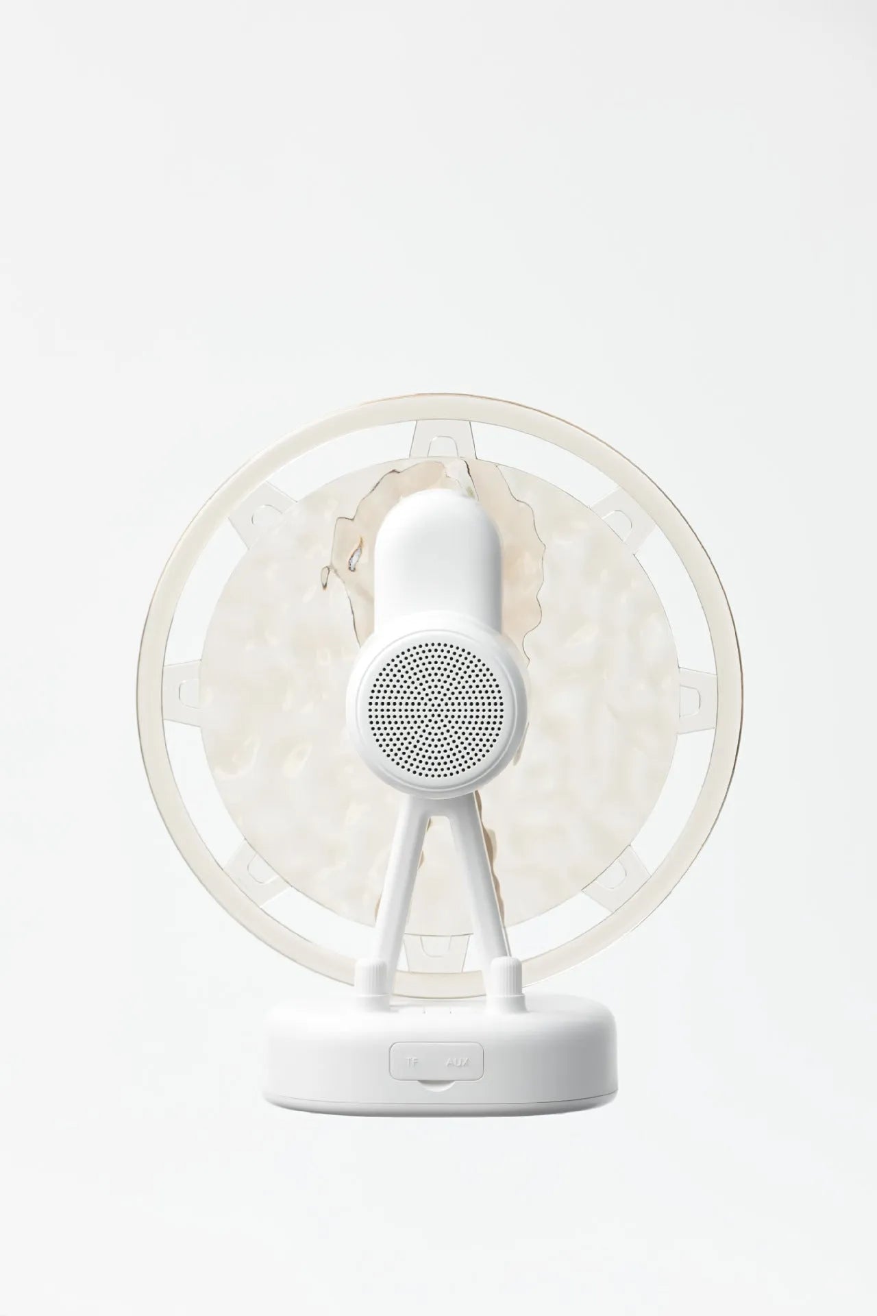 Ferris wheel water ripple Bluetooth speaker with colourful atmosphere light in pink on a white background