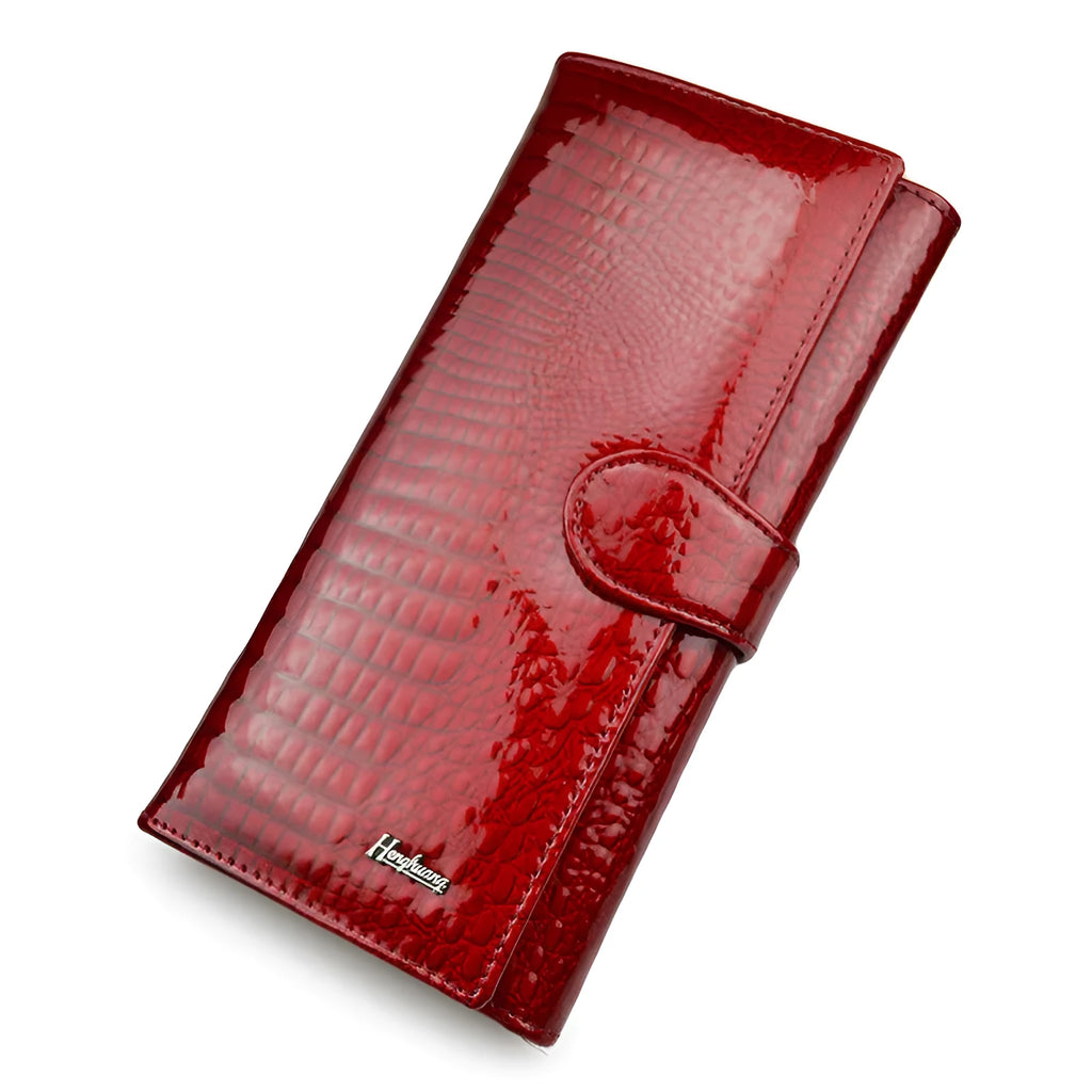 Women's leather coin purse with patent leather crocodile pattern texture in wine red colour