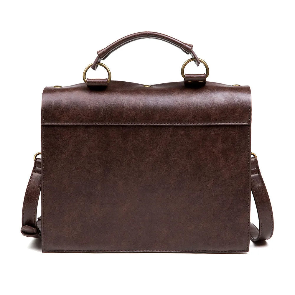 Bronze steampunk shoulder bag with metal detailing and horizontal pillow shape