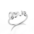 Small unisex copper LOVE ring with engraved text in gold finish for couples