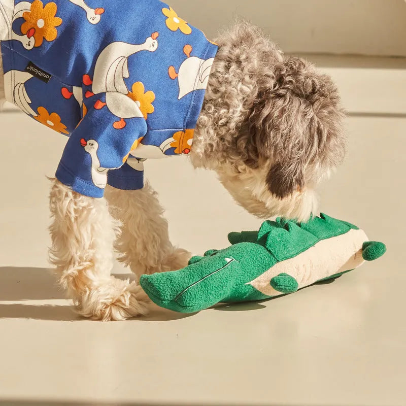 Green fabric plush toy dog measuring 35cm by 18cm for interactive play