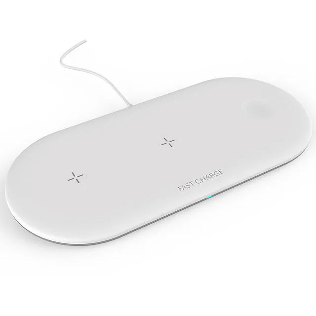 Black and white 3-in-1 wireless charging station for Apple Watch, iPhone and compatible earbuds on a desk.