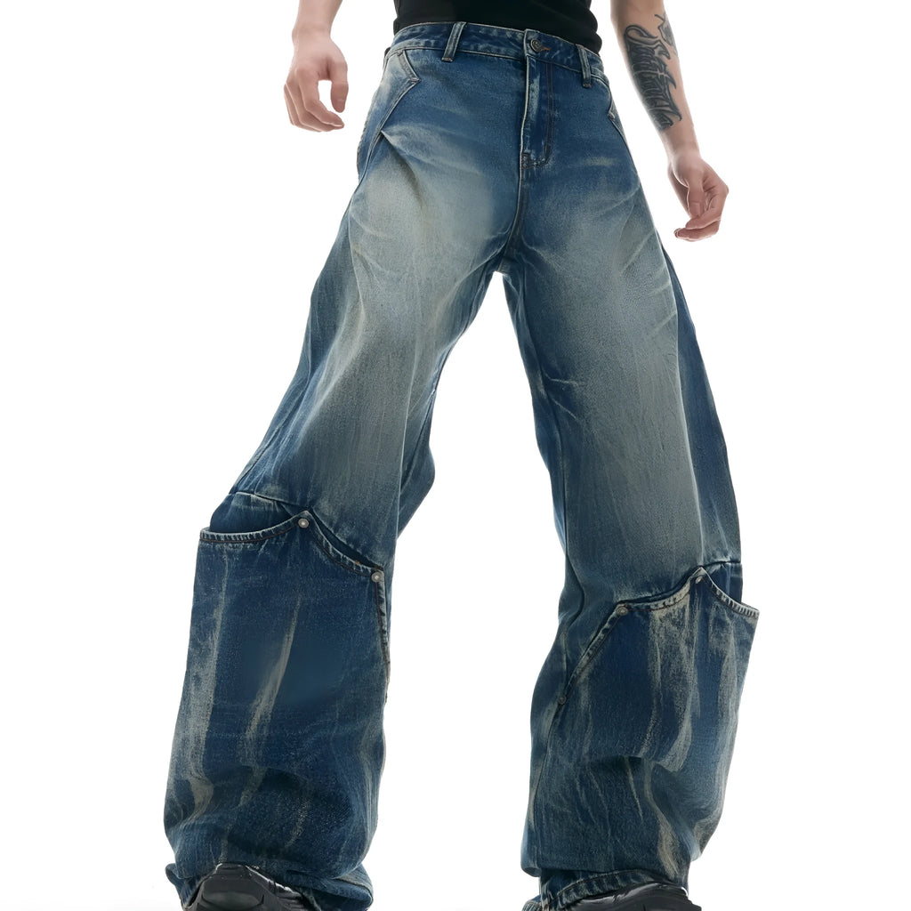 Men's retro washed burst pattern jeans in verdant blue with loose fit and curved knife style.