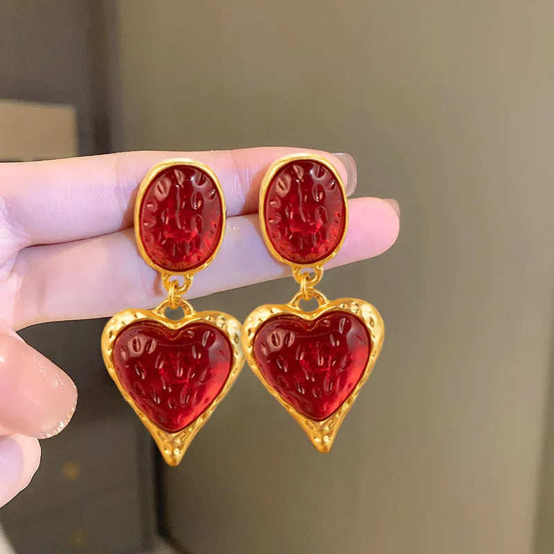 Silver needle pleated oval love heart alloy stud earrings in purple, red, green, and yellow-white.