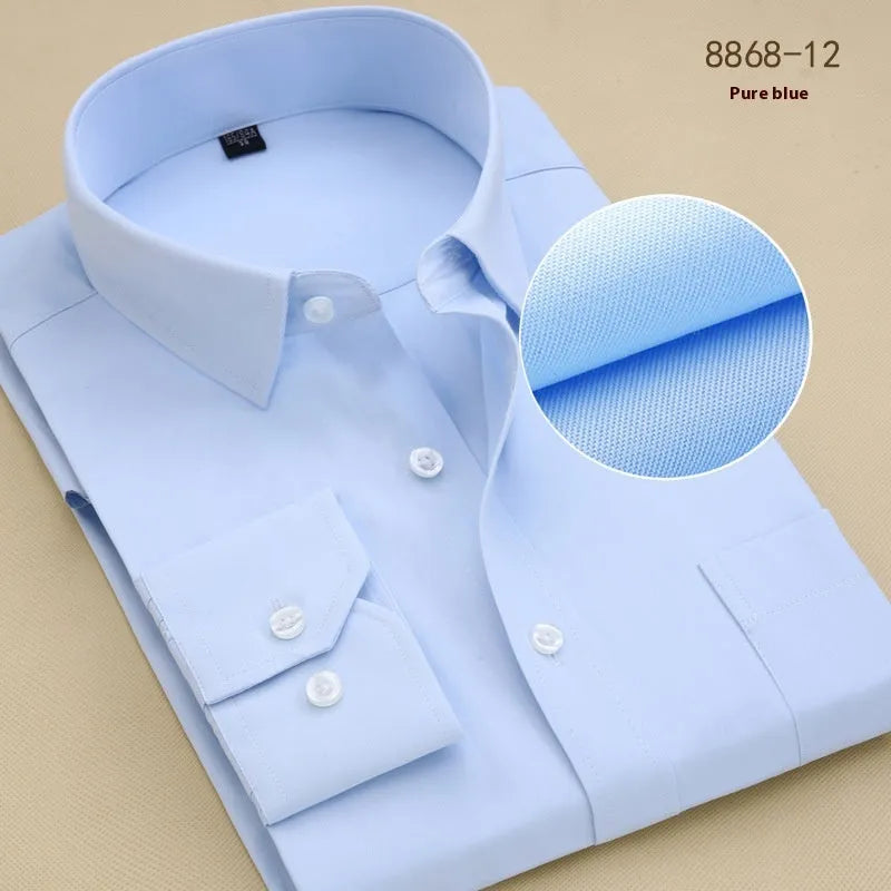Men's black slim fit long sleeve business shirt made from cotton fabric on a hanger.