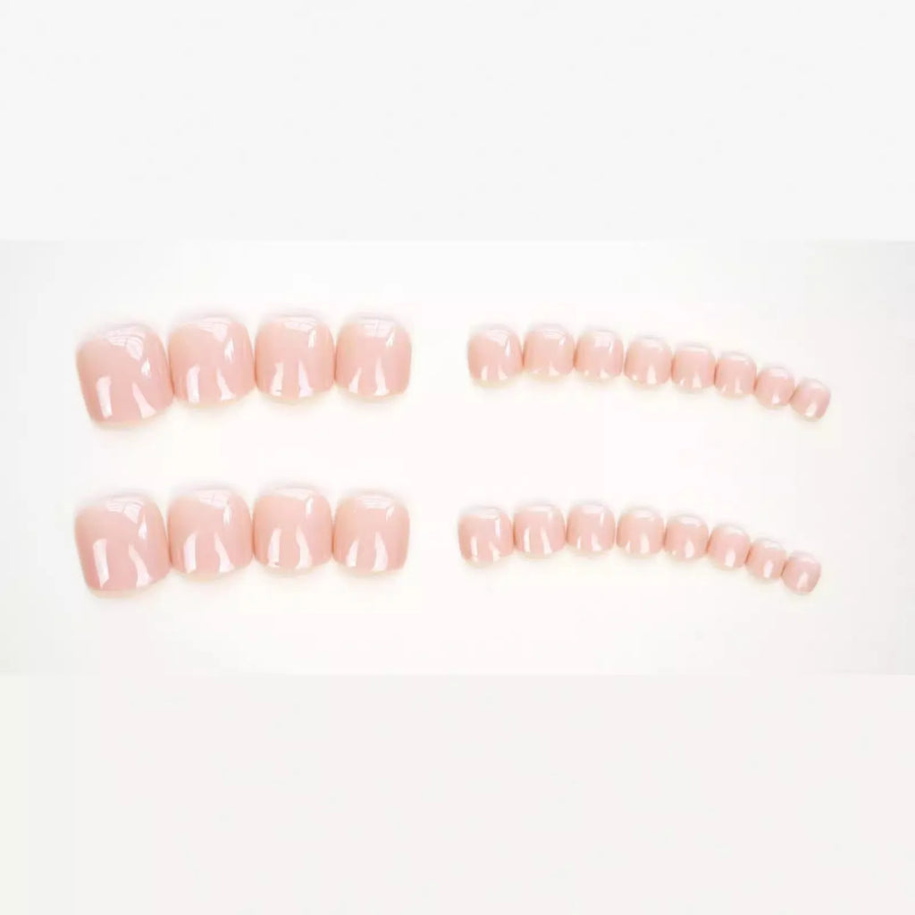 Skin colour plastic toenail stickers with J-52 design and adhesive glue for nail decoration