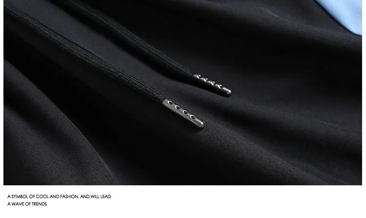 Men's black quick-drying sports shorts with elastic waistband in loose straight-leg cut above knee length