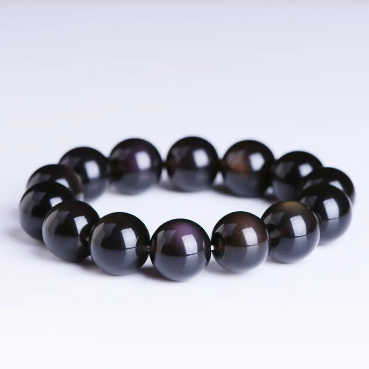 Polished natural icy obsidian Pi Xiu bracelet with ethnic geometric design