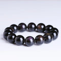 Polished natural icy obsidian Pi Xiu bracelet with ethnic geometric design