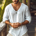Men's beige V-neck long-sleeved t-shirt in a slim fit laid flat.