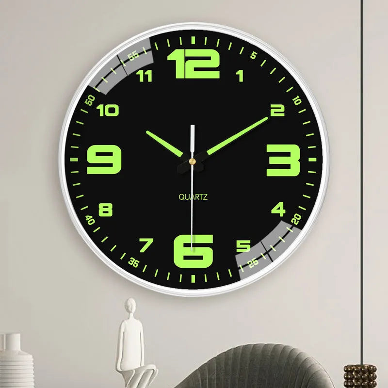 Modern 8 inch diameter luminous wall clock with plastic shell on a wall.