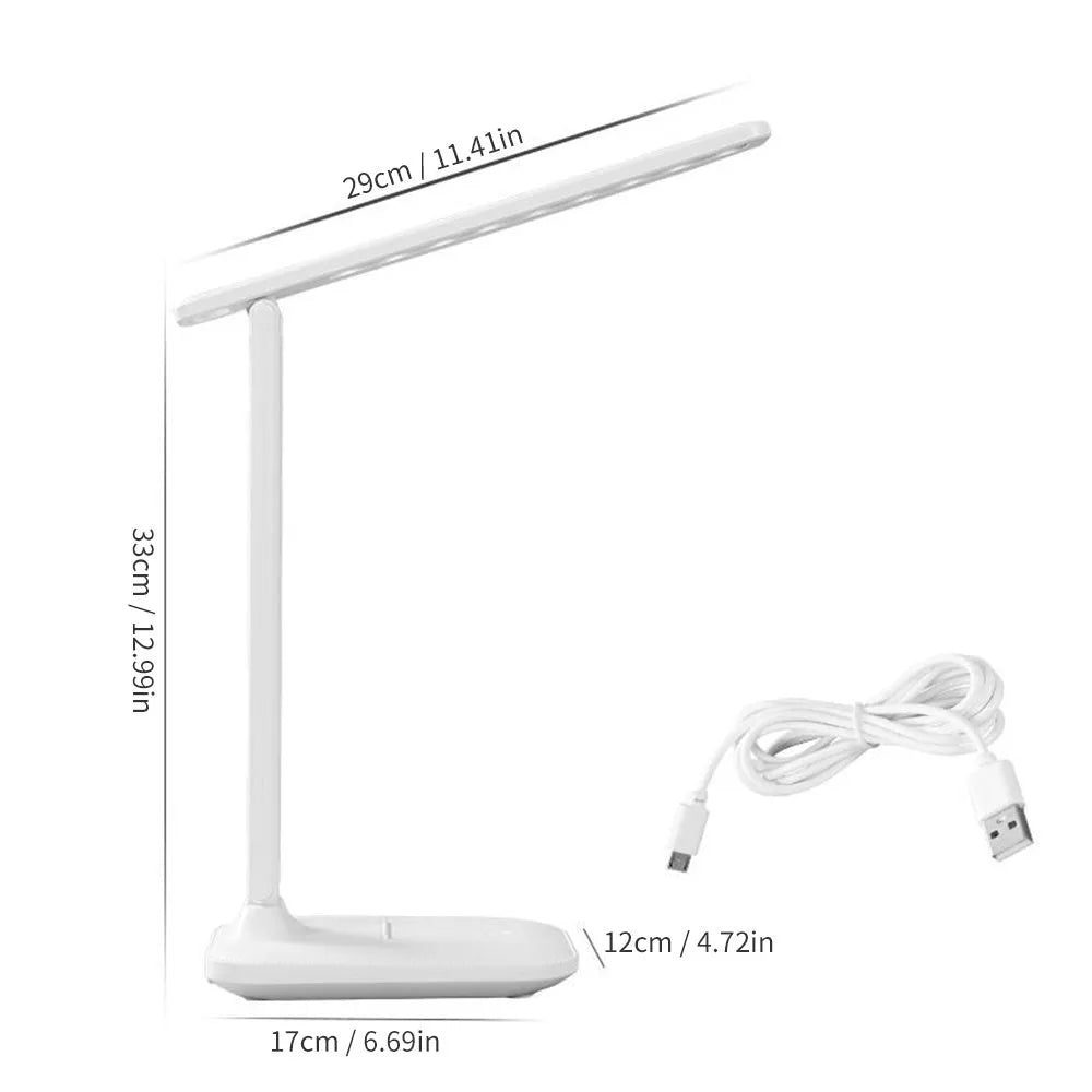 White USB rechargeable bedside lamp with touch dimming control on a wooden table.