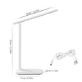 White USB rechargeable bedside lamp with touch dimming control on a wooden table.