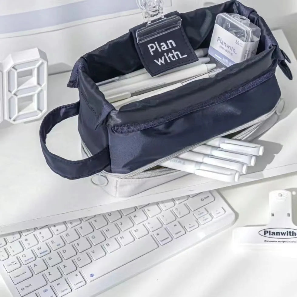 Polyester folding double-layer pencil case in dark blue, blue, and cream white colours.