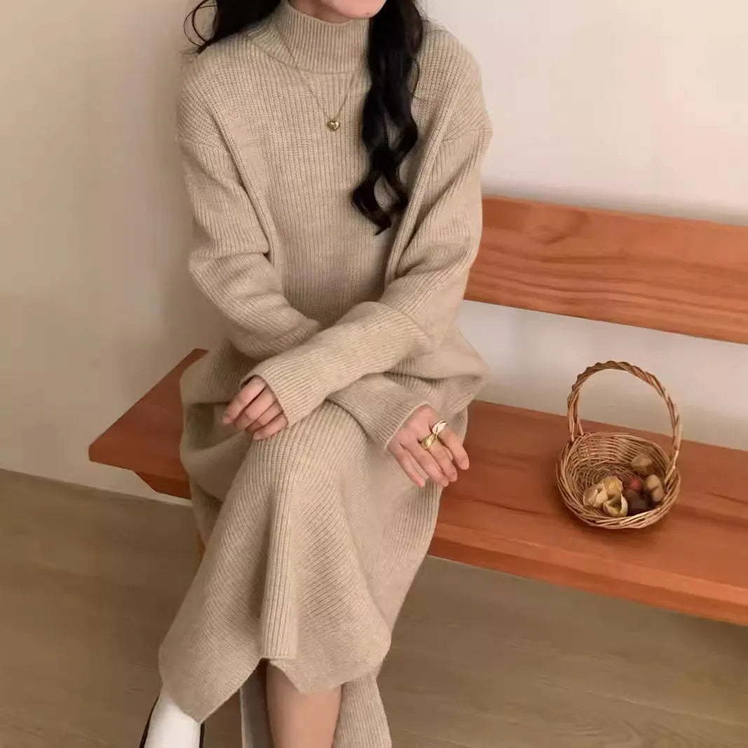 Women's beige half-turtleneck knitted midi dress with long sleeves on a hanger.