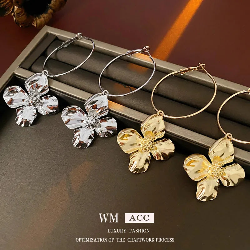 Silver needle drop metal flower earrings with geometric vintage design in gold and silver electroplated finishes