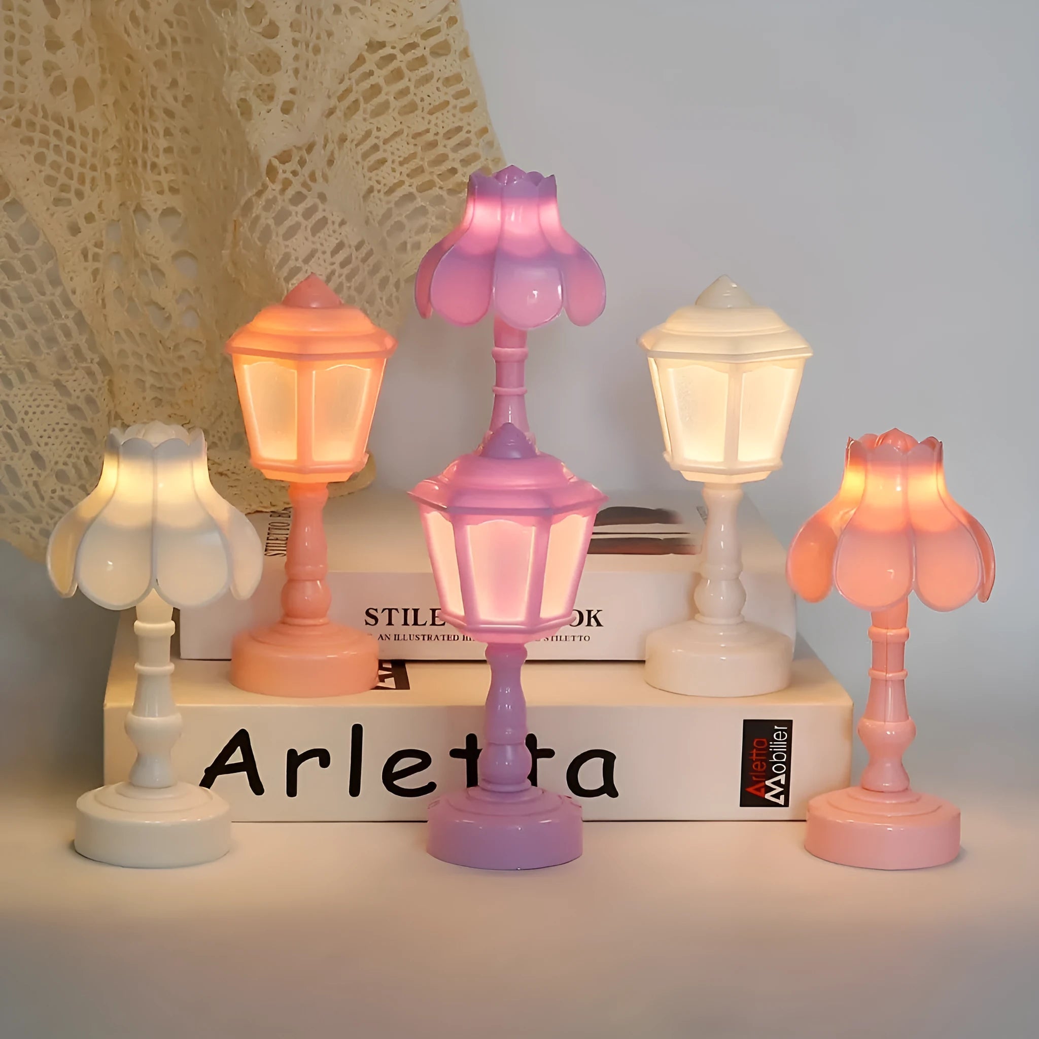 Retro pagoda-shaped small LED night lamp in light purple with geometric stereo design