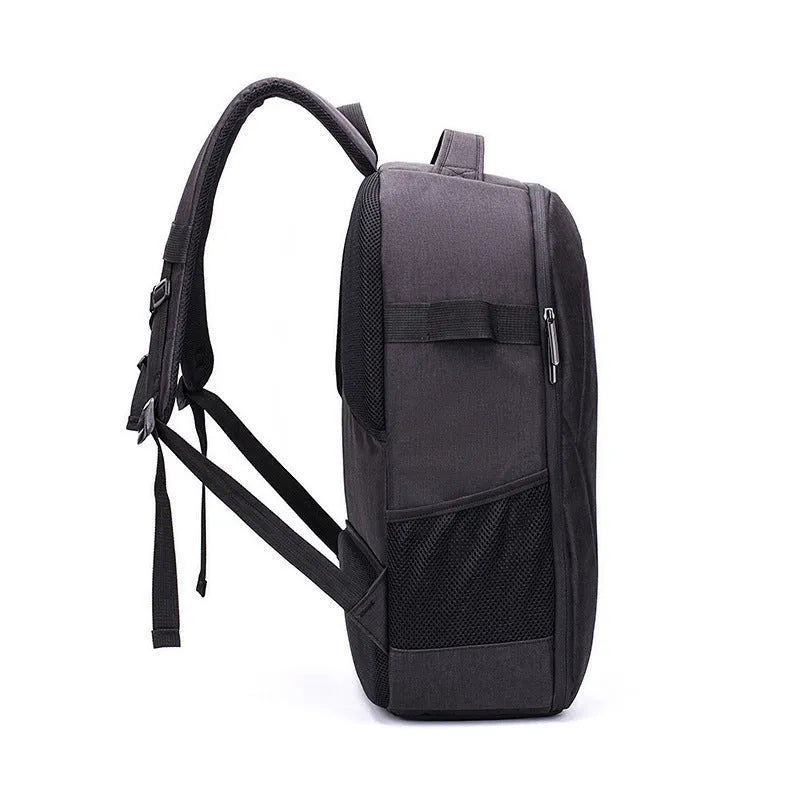 Black oxford cloth drone backpack showing laptop compartment and internal organisation pockets