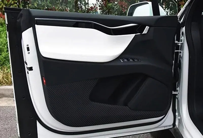 Four-piece carbon fibre protective film for Tesla Model S car door panels