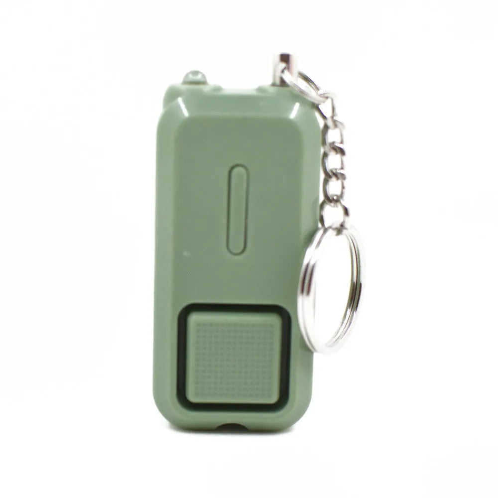 Pink personal safety alarm device measuring 65x30mm with keychain attachment