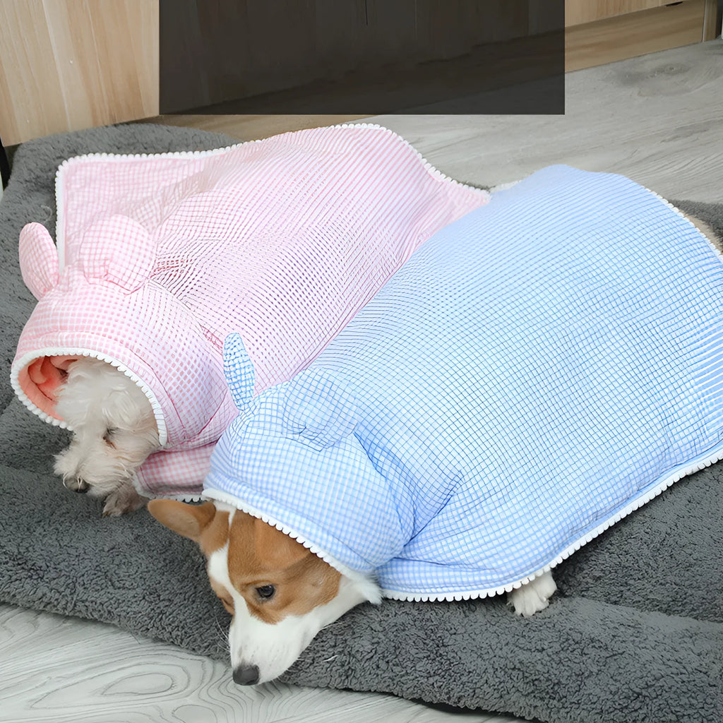 Cute plaid cotton dog cloak quilt with pink grid pattern on a small dog