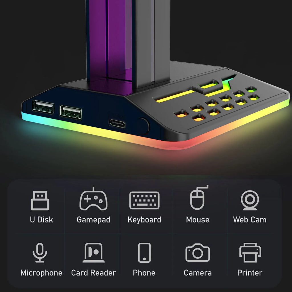 RGB headphone display stand with dual USB ports and colour changing lights on a desk