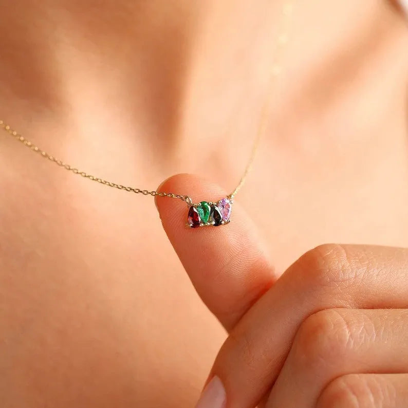 Zircon stone pendant on a delicate titanium steel clavicle chain, shown in an electroplated silver finish.